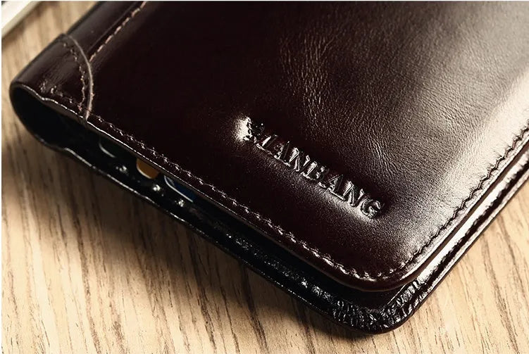 Men's black leather wallet open to show internal card slots, coin pocket, and document sleeve.