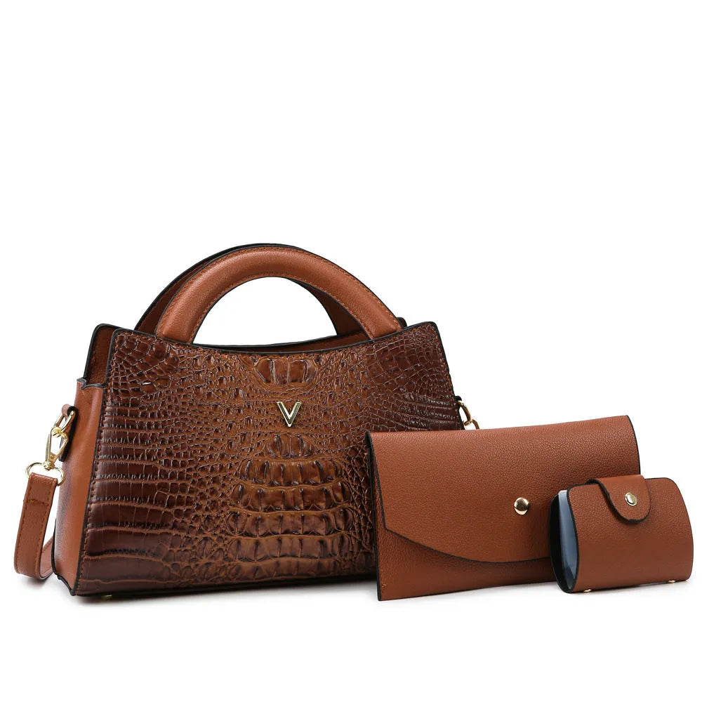 Women's black crocodile pattern PU leather crossbody shoulder bag with internal pockets.