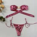 Women's glossy sapphire blue bikini with gold starfish detail on split tube top