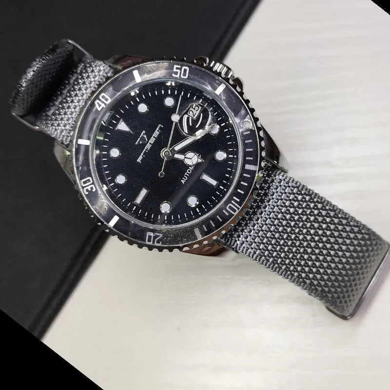 Nylon integrated watch strap in Army Green colour showing textile texture and 20mm width.