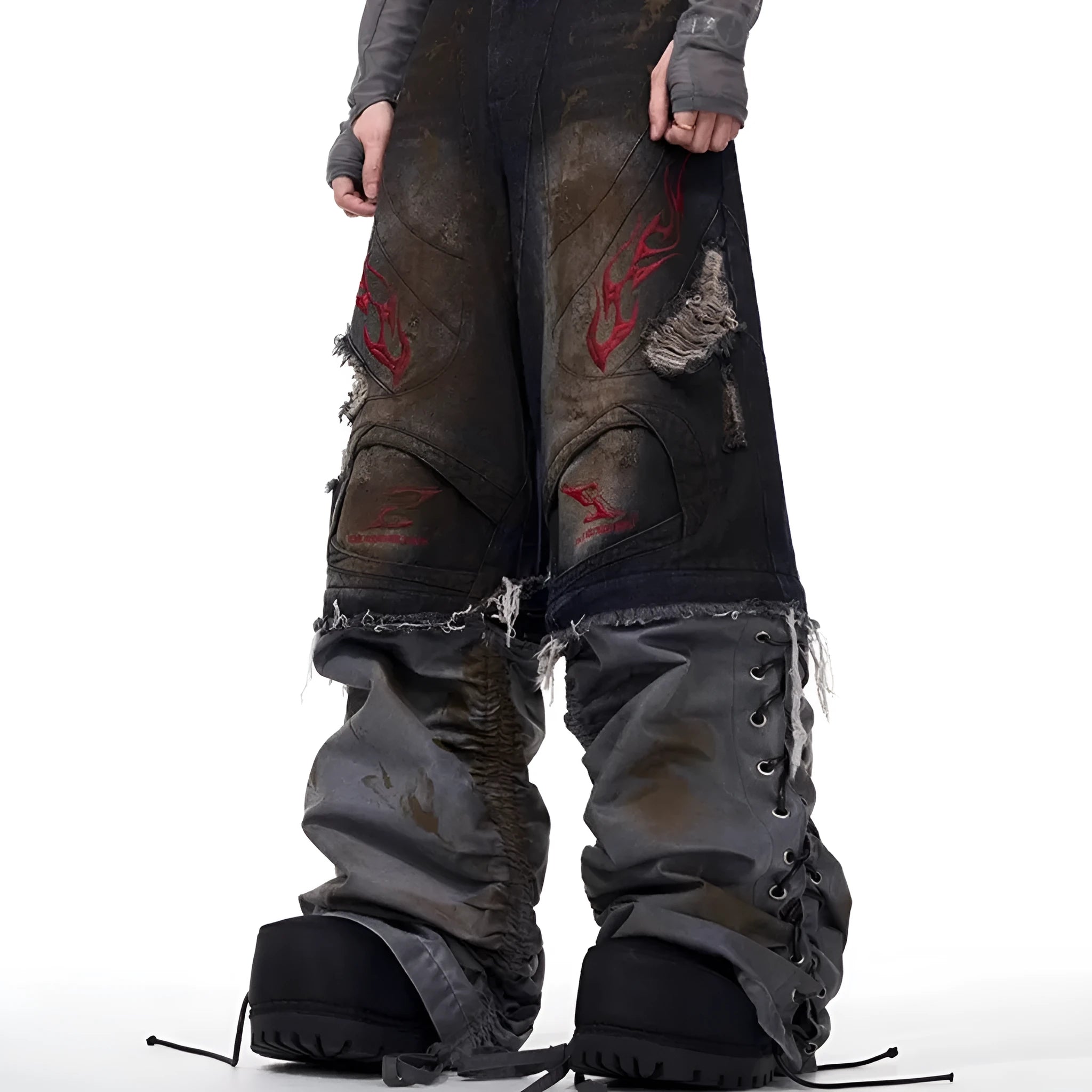 Man wearing grey wide-leg retro jeans with detachable trouser legs.
