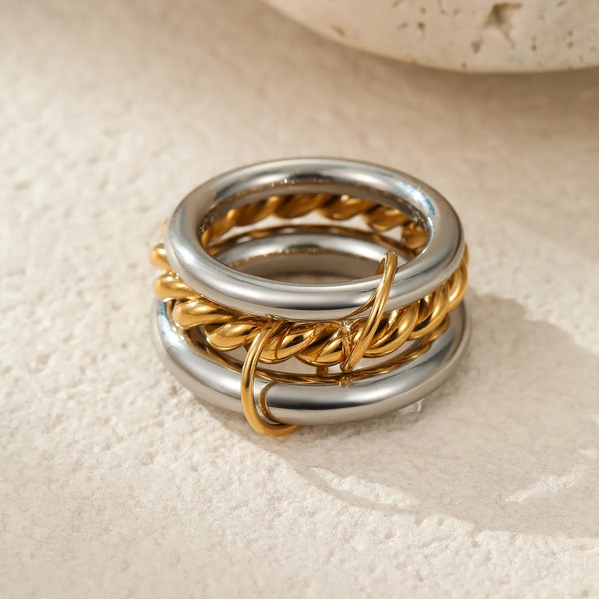 Stacked stainless steel rings with 18K gold plating in three colour options for women's hand jewellery
