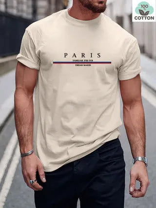 Man wearing a loose-fit short-sleeved t-shirt with a large letter print on the chest in a solid colour.
