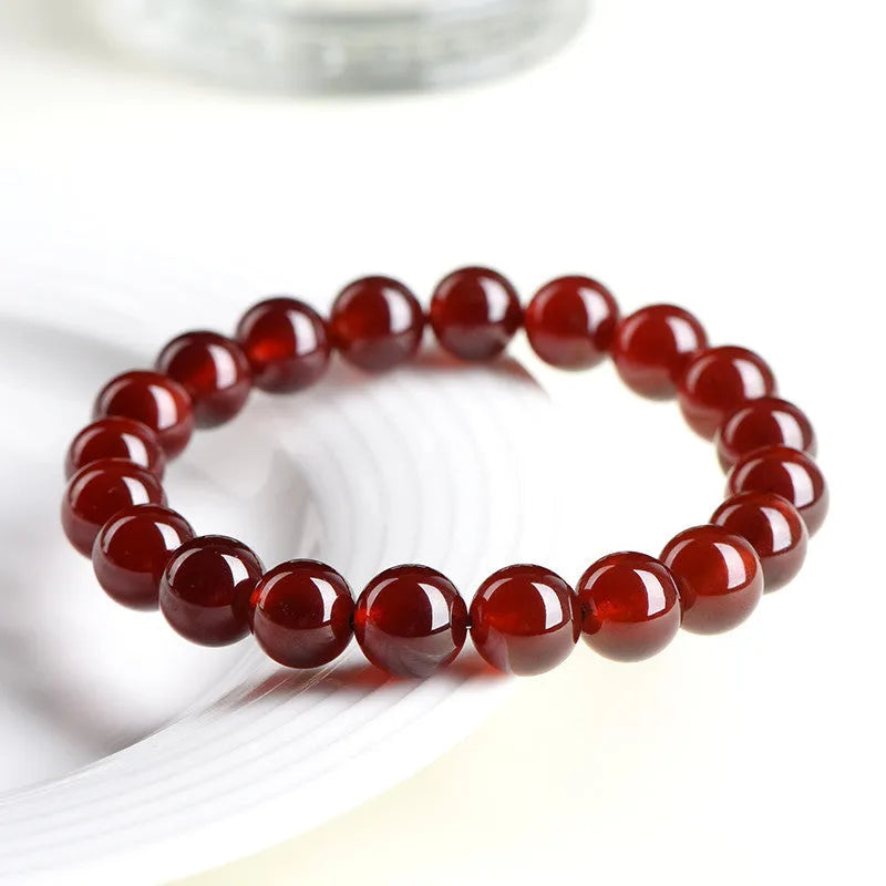 Natural orange red garnet ball crystal bracelet with traditional ruyi charm in retro style