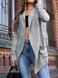 Grey thick-knit women's viscose cardigan with front pockets, shown loose-fitting and medium length.