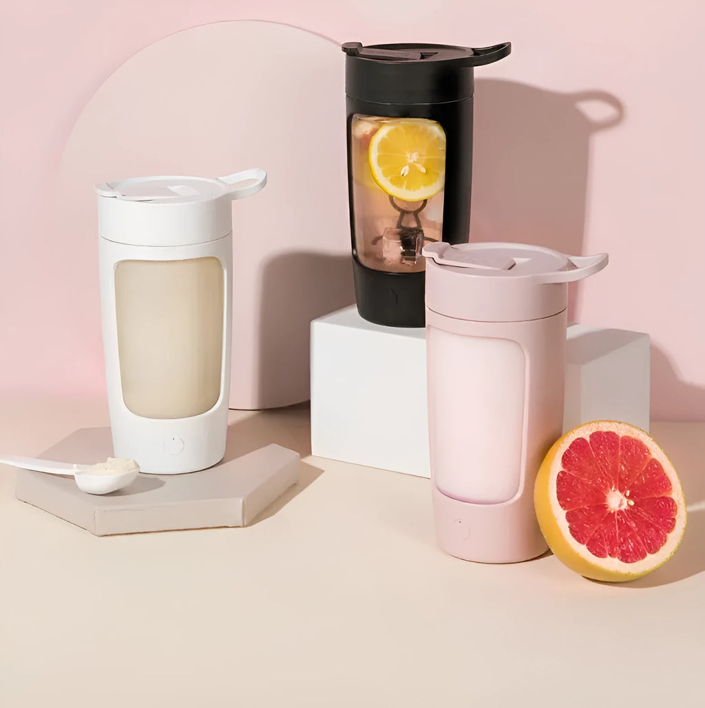 Portable rechargeable blender cup in black, blue, pink, and white colours, showing 650ml capacity and compact size.
