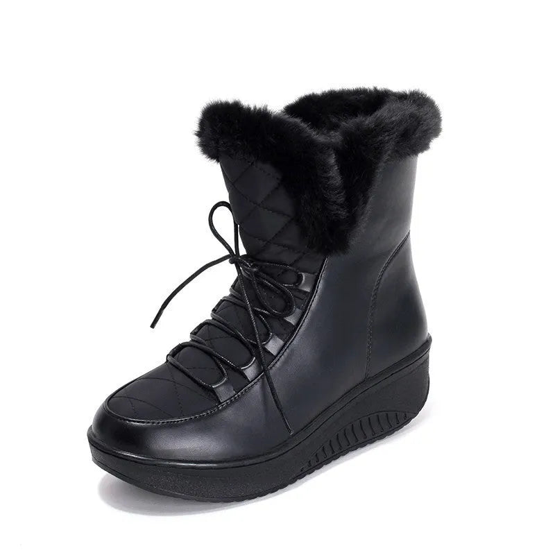 Women's black lace-up winter boots with a platform heel on a white background.