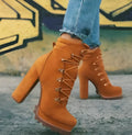 Women's suede thick-heel knee-high boots in army green with rivet details and a round toe.
