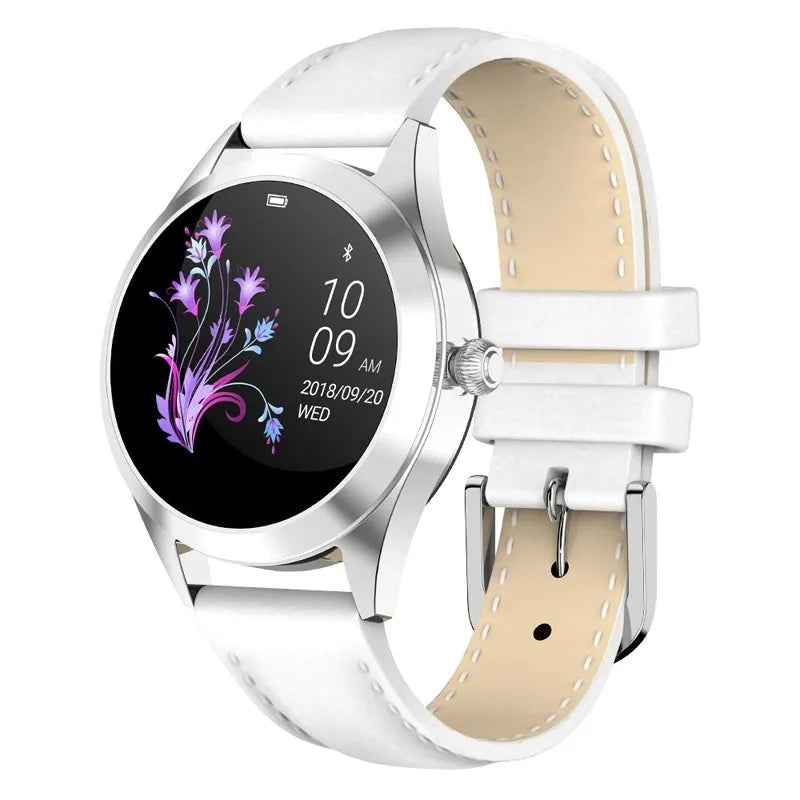 Women's multi-functional sports smartwatch in black, rose gold, silver, or white on a wrist.