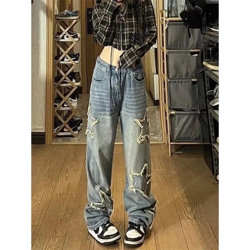 Blue high-waisted wide-leg denim jeans with straight cut on woman