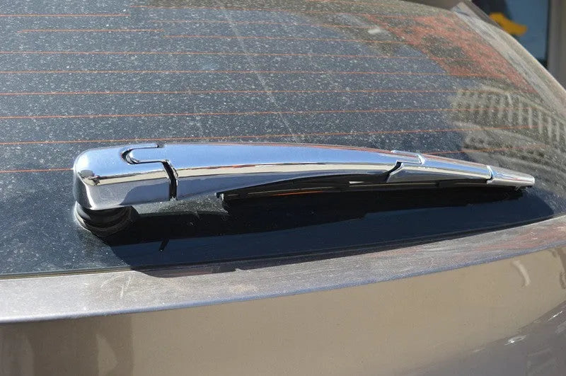 Set of four silvery ABS plastic rear wiper arm cover trims for 2010 Hyundai models.