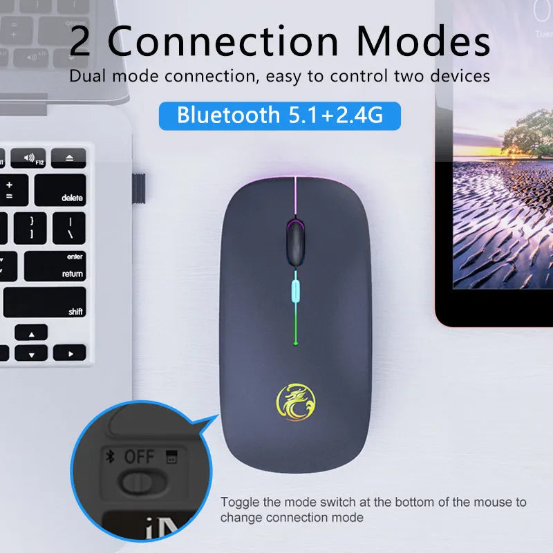 Black or white dual-mode wireless silent mouse with USB charging cable on desk