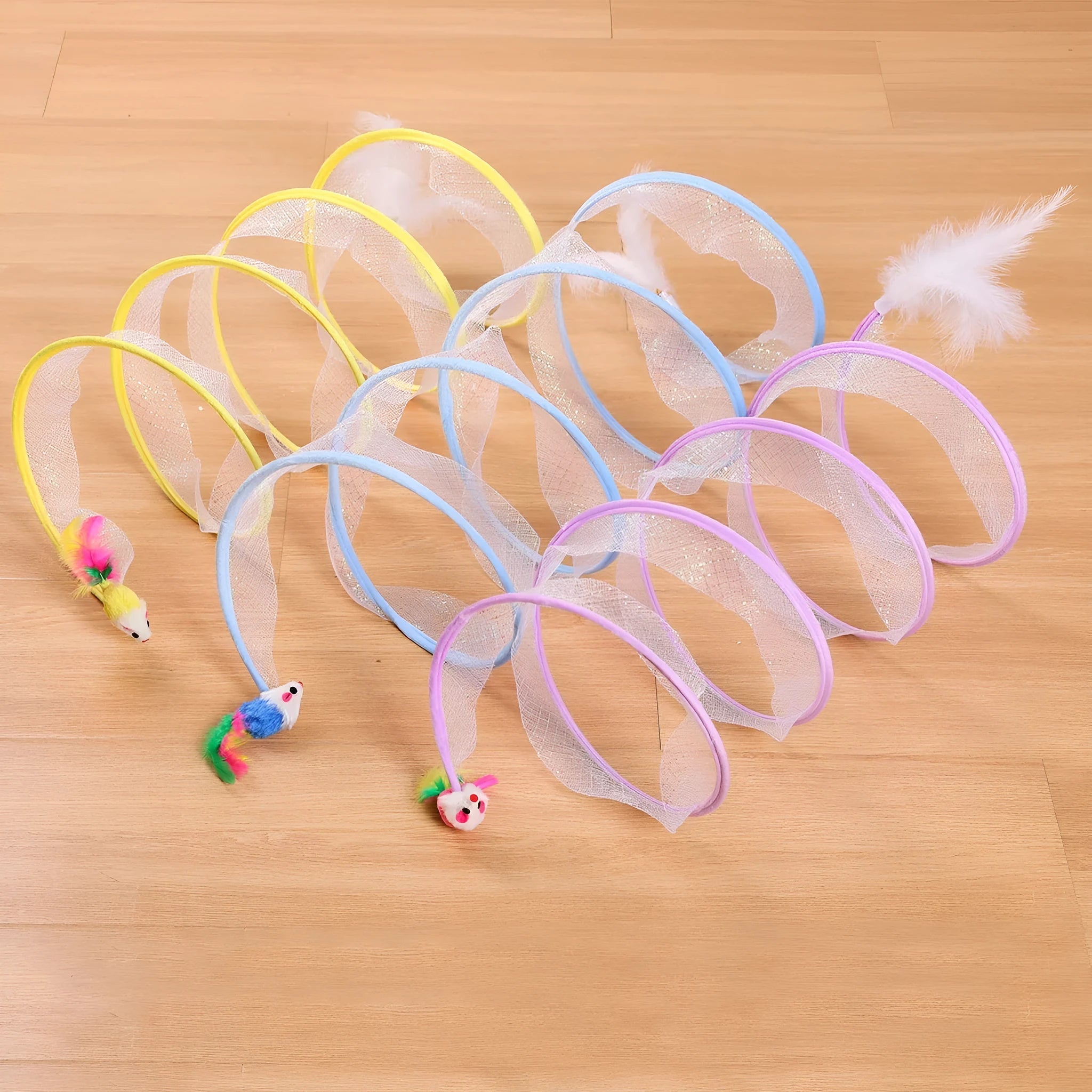 S-shaped cat tunnel toy with steel wire frame, elastic netting walls, and colourful feather attachments