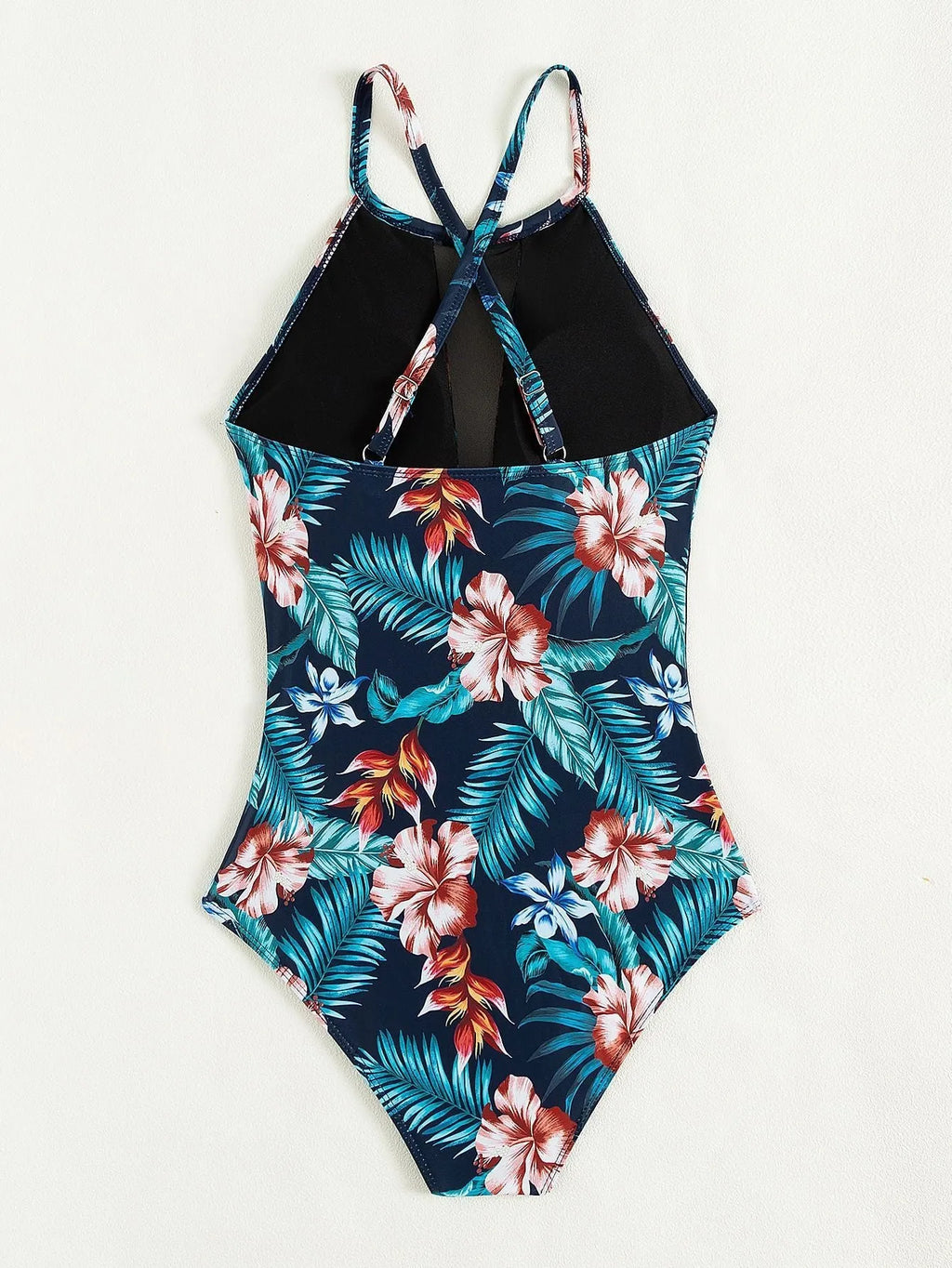 Women's deep V-neck one-piece swimsuit in a solid colour on a mannequin.