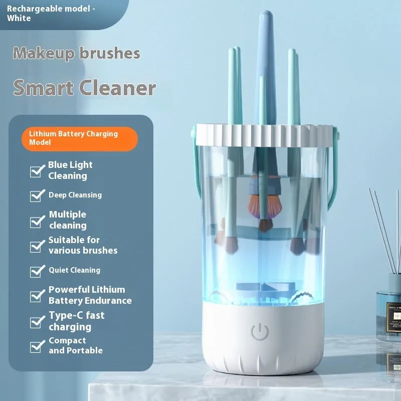 White rechargeable electric makeup brush cleaning tool with USB cable.