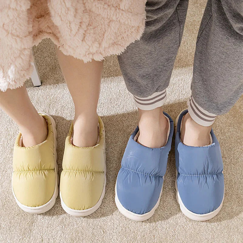 Down cotton slippers with artificial leather upper, rubber sole and plush lining in multiple colours