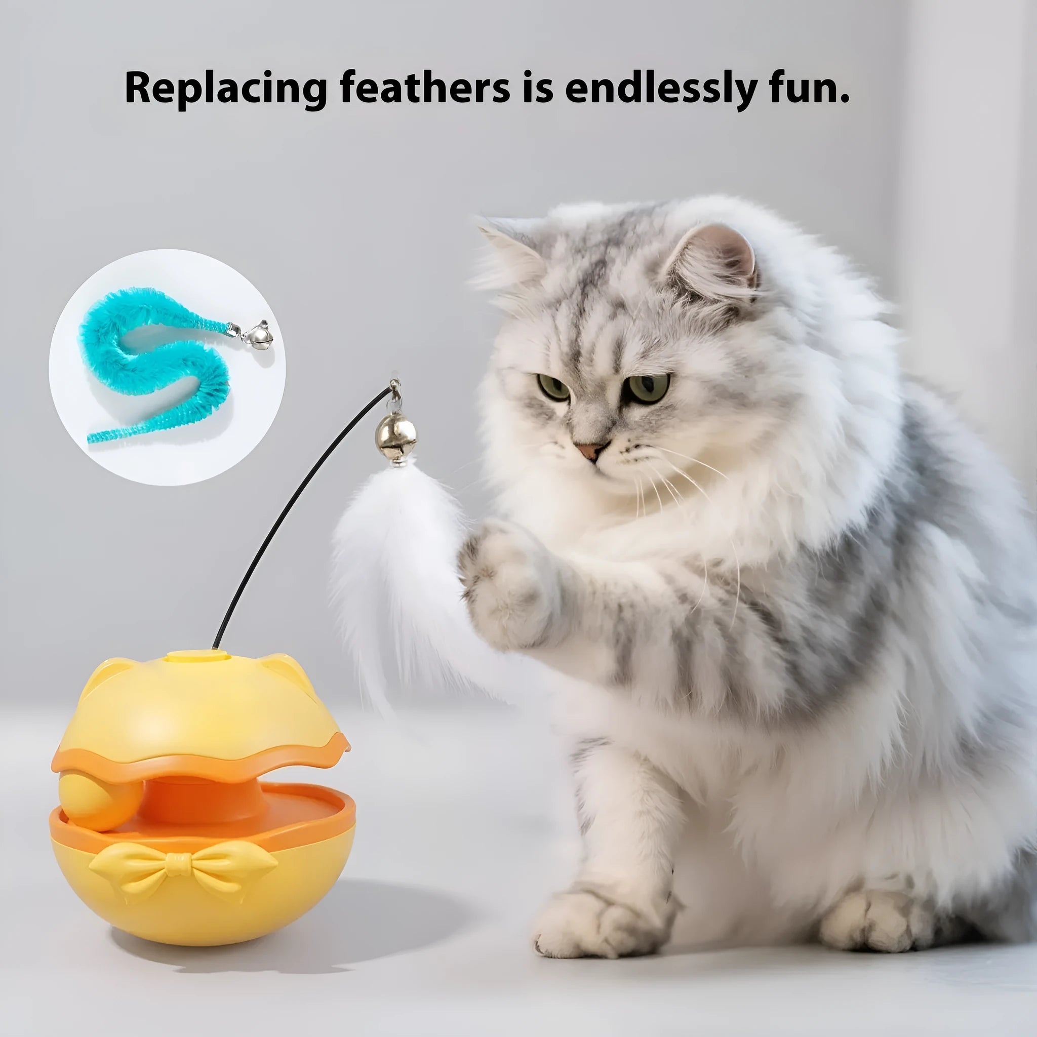 Electric cat toy tumbler in lemon yellow colour with a separate cat teasing stick on a wooden floor.