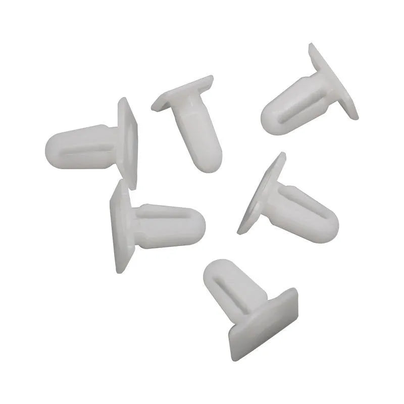 Sixty grey PA66 plastic car interior trim clips arranged on a white surface.