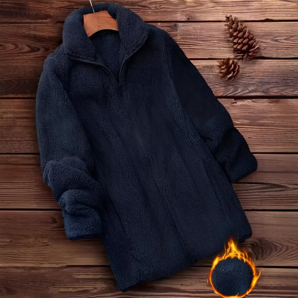 Double-sided fleece jacket in black, navy blue, or khaki colour on a hanger.