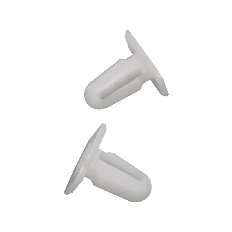 Sixty grey PA66 plastic car interior trim clips arranged on a white surface.