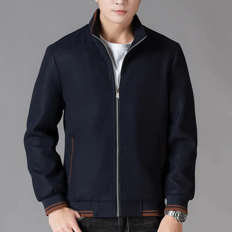 Men's grey polyester fleece sports jacket with long sleeves and a stash pocket on the chest.