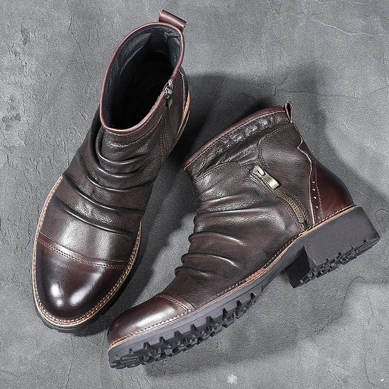Brown mid-calf Martin boots with side zipper, embossed pattern, and a rubber sole with a mid-heel.
