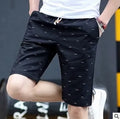 Men's cotton summer shorts in thin fabric with mid-waist design and lace-up closure, shown in multiple colour options