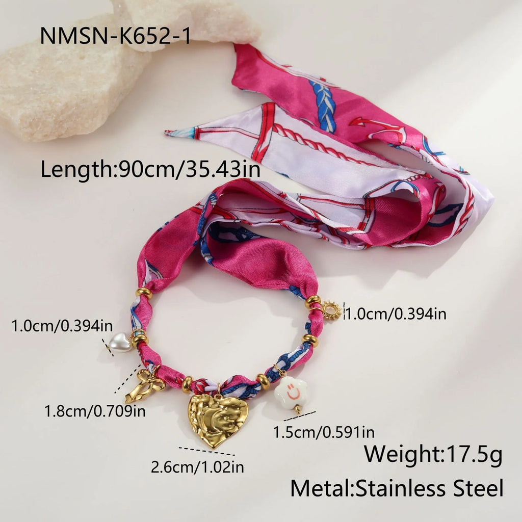 Stainless steel jewellery set with geometric pendant necklace and matching bracelet featuring 18K gold plating