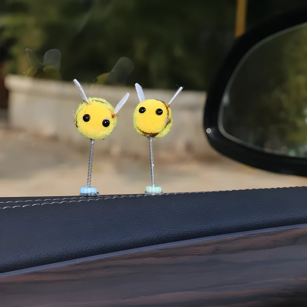 Yellow and black fur ball bee car decoration measuring 3x3 cm