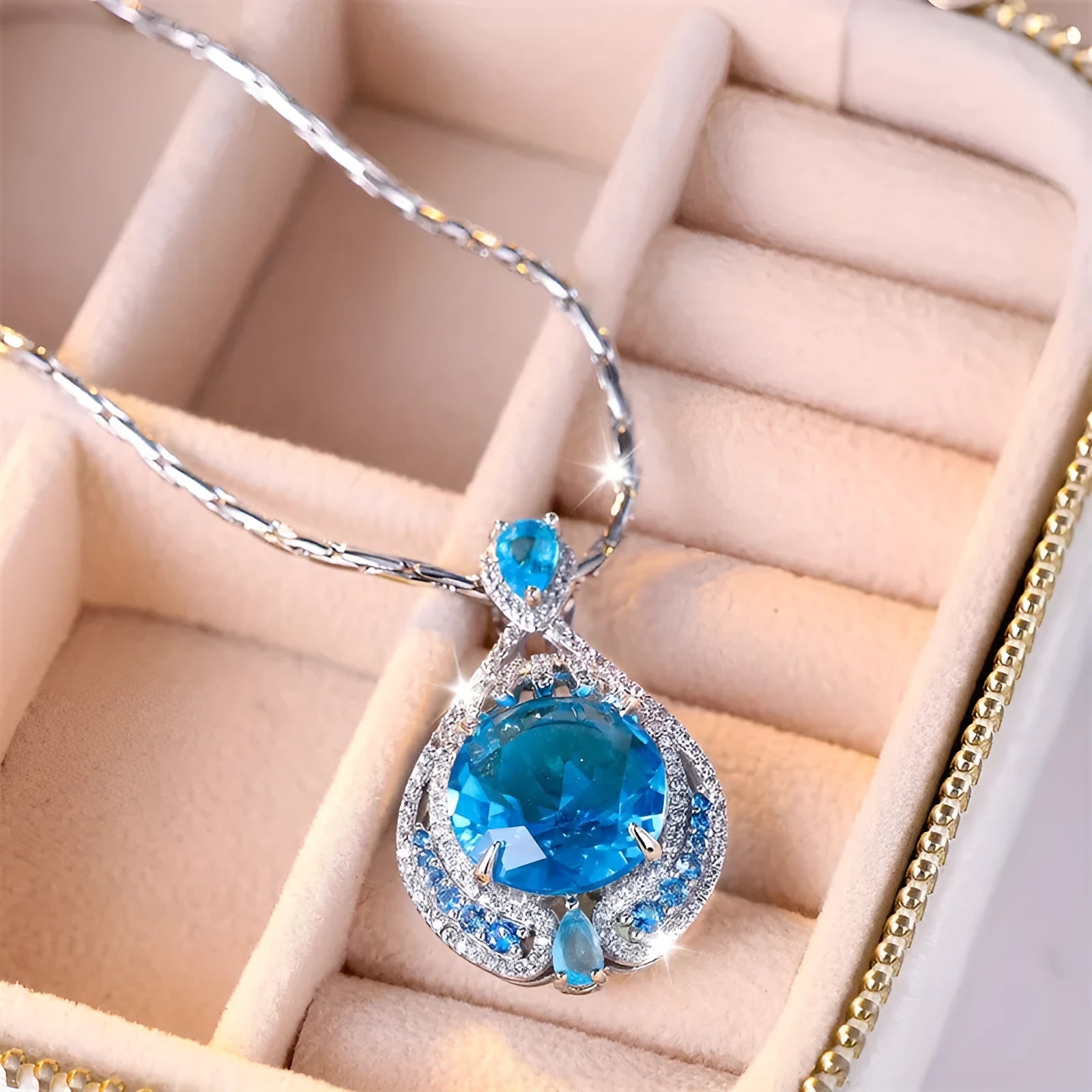 Blue geometric crystal pendant necklace with water wave chain and fireworks-cut gems