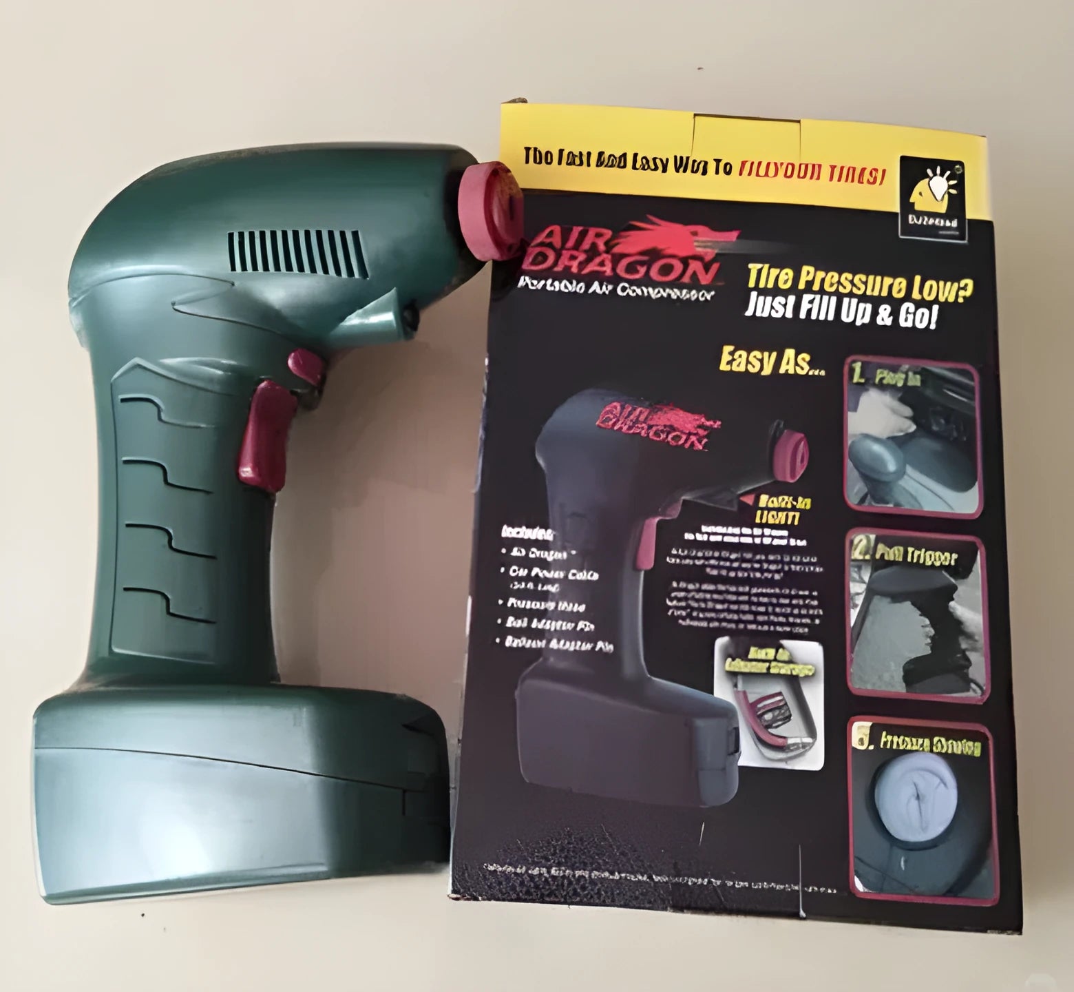 Portable electric car air pump with motor and inflation hose for vehicle tyres