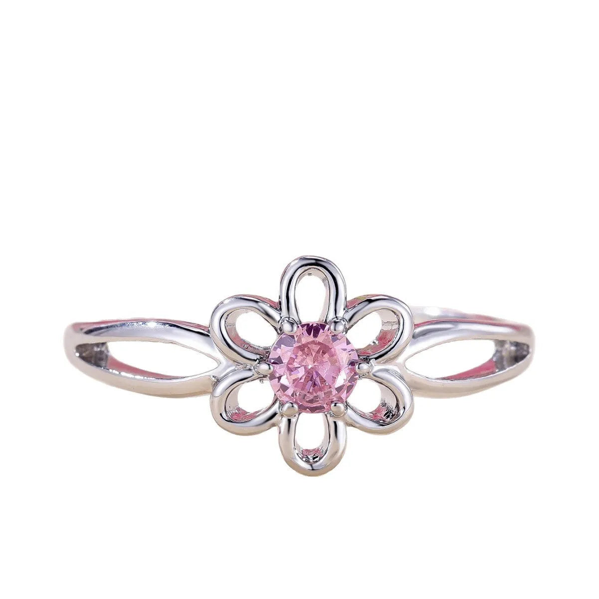 Women's flower-shaped hollow-out copper fashion ring in platinum pink diamond colour.