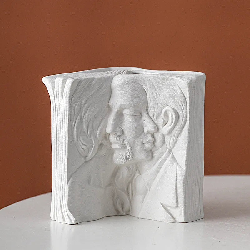 Ceramic decorative book stand in a modern simplicity style on a wooden desk.