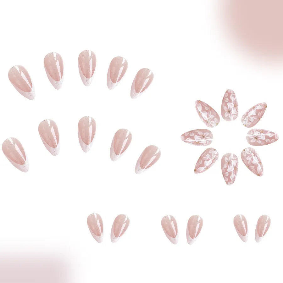 Short almond press on nails with French tip, flower pattern and glitter powder in C625 style