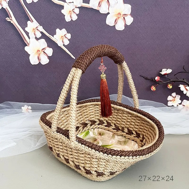 Round hand-woven hemp rope basket in a natural colour with a flat base.
