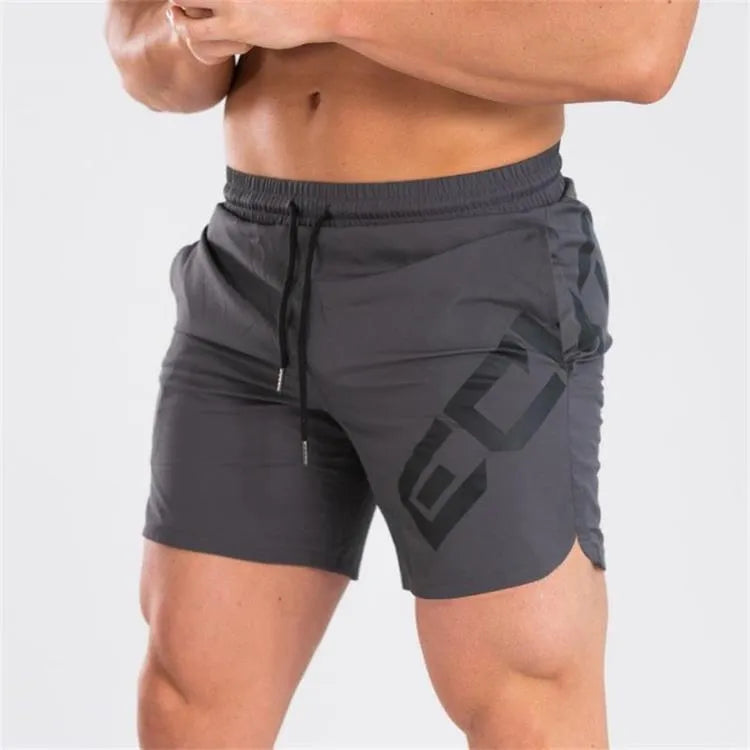 Men's black elastic training shorts with a mid-waist and knee-length cut for summer sports.