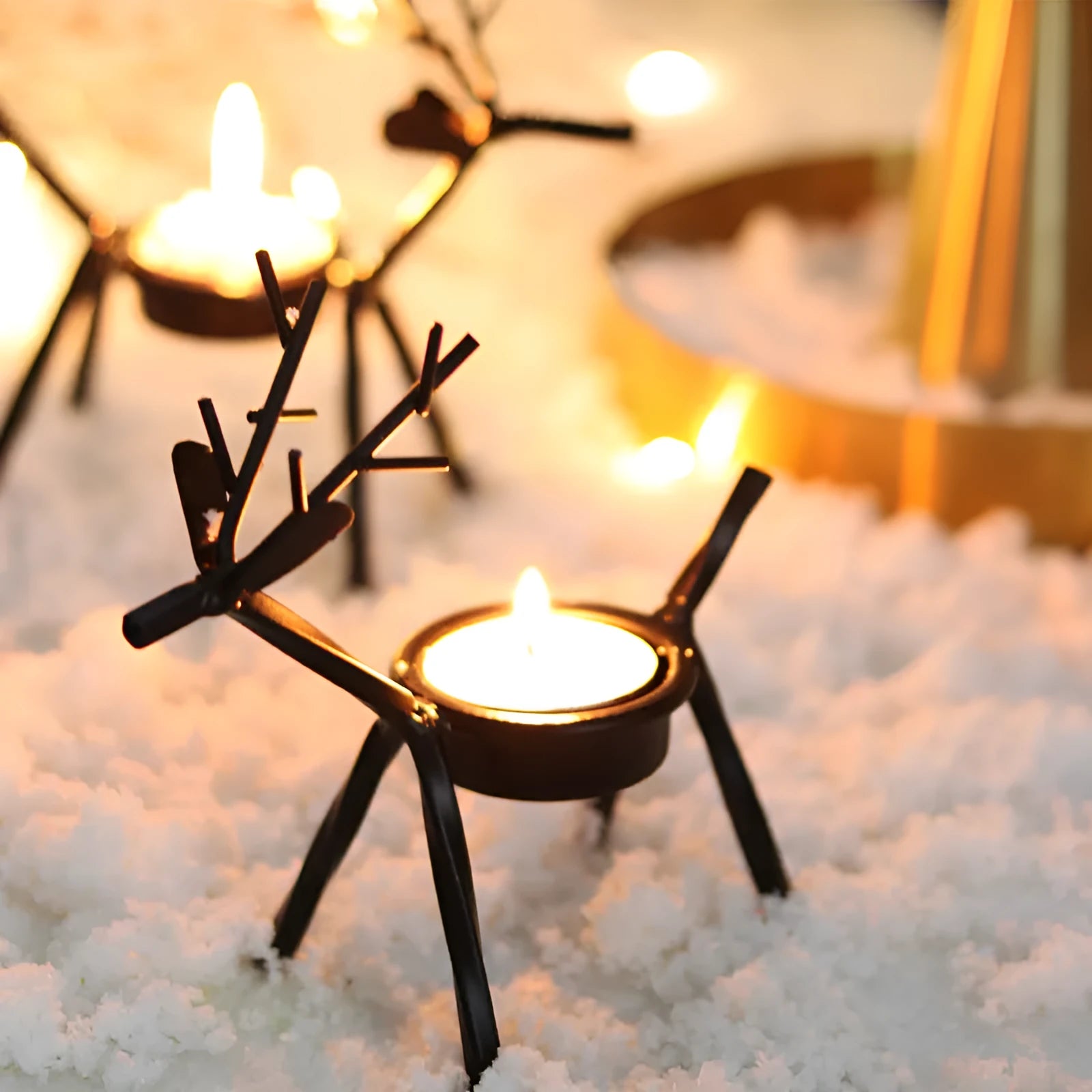 Black iron Christmas candlestick with deer or elk design for candle holding