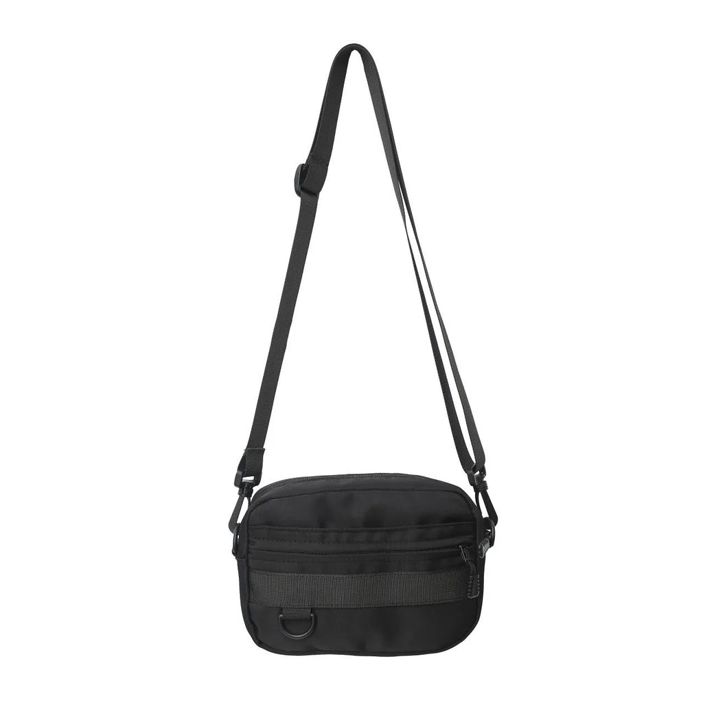 Men's street style nylon messenger bag in crossbody configuration with sewing thread detailing
