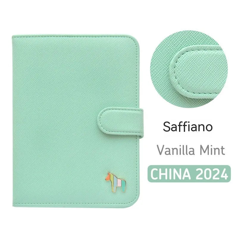 Compact leather-covered 396-day schedule book for hand accounting, shown lying open flat.