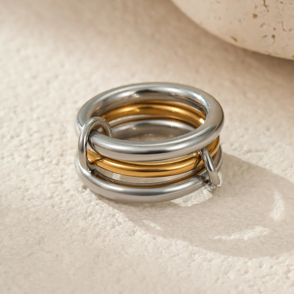 Stacked stainless steel rings with 18K gold plating in three colour options for women's hand jewellery