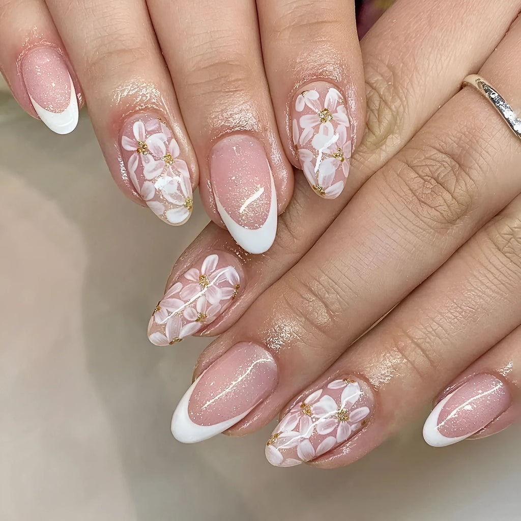 Short almond press on nails with French tip, flower pattern and glitter powder in C625 style