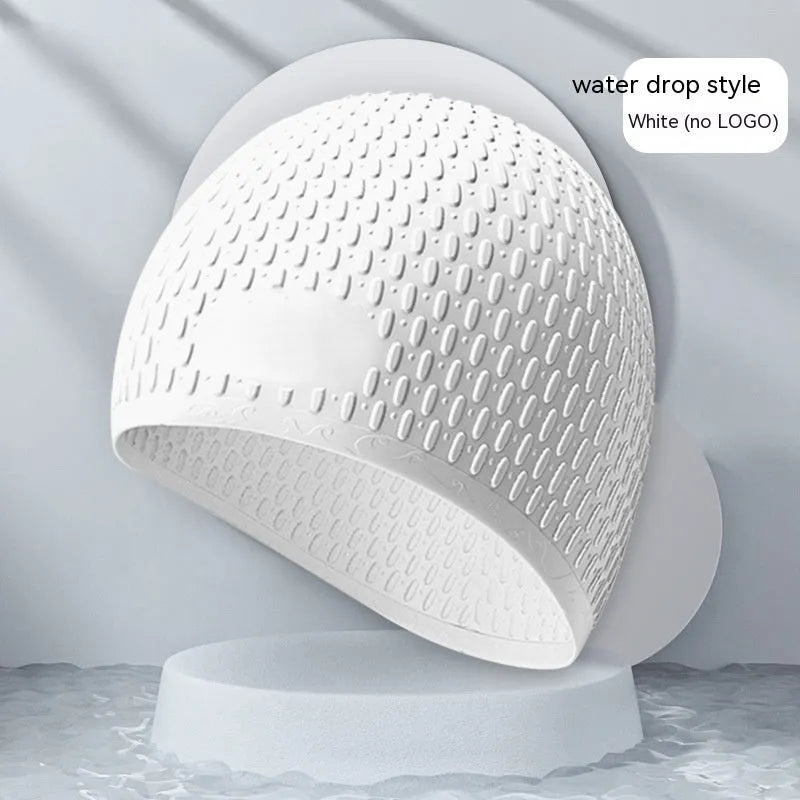 Silicone swimming cap for adults in various solid colours on a white background.