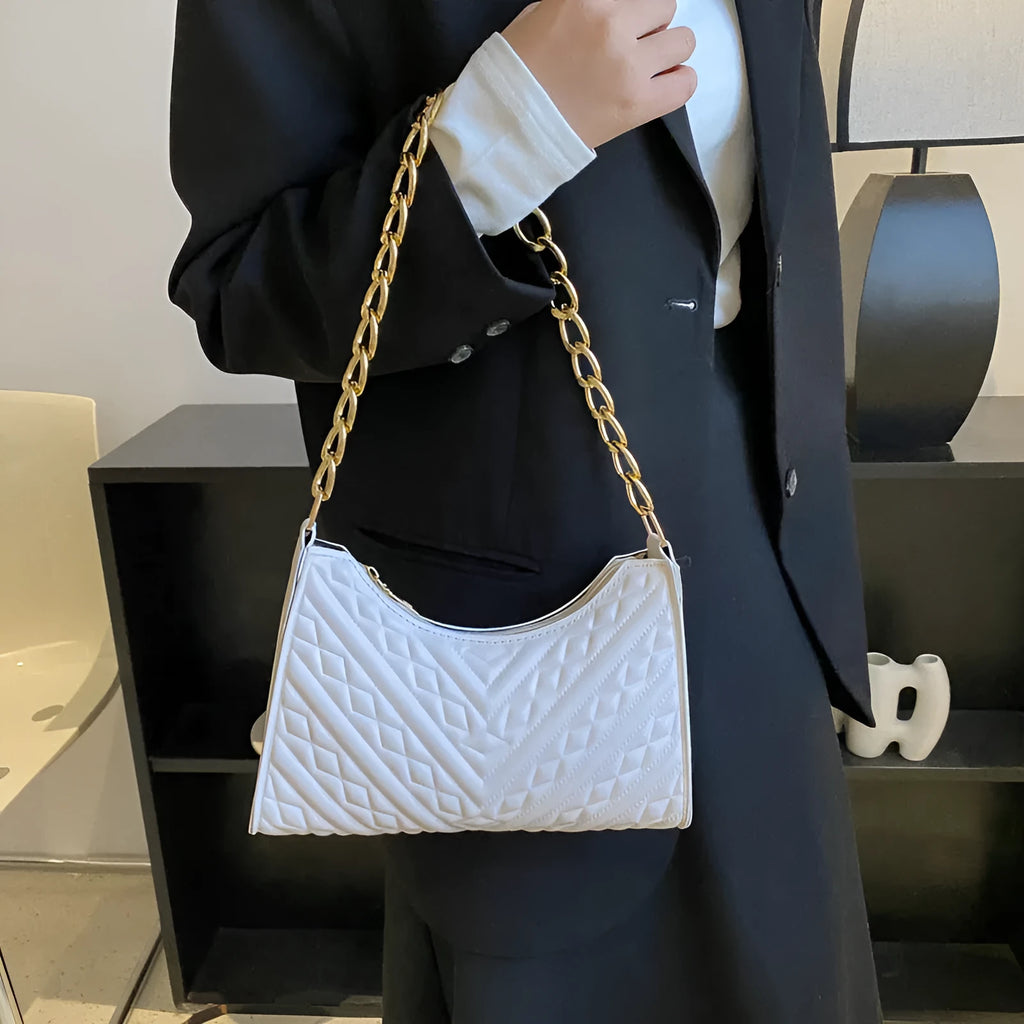 Black PU leather vertical square shoulder bag with chain strap, soft handle, and 3D outer pockets