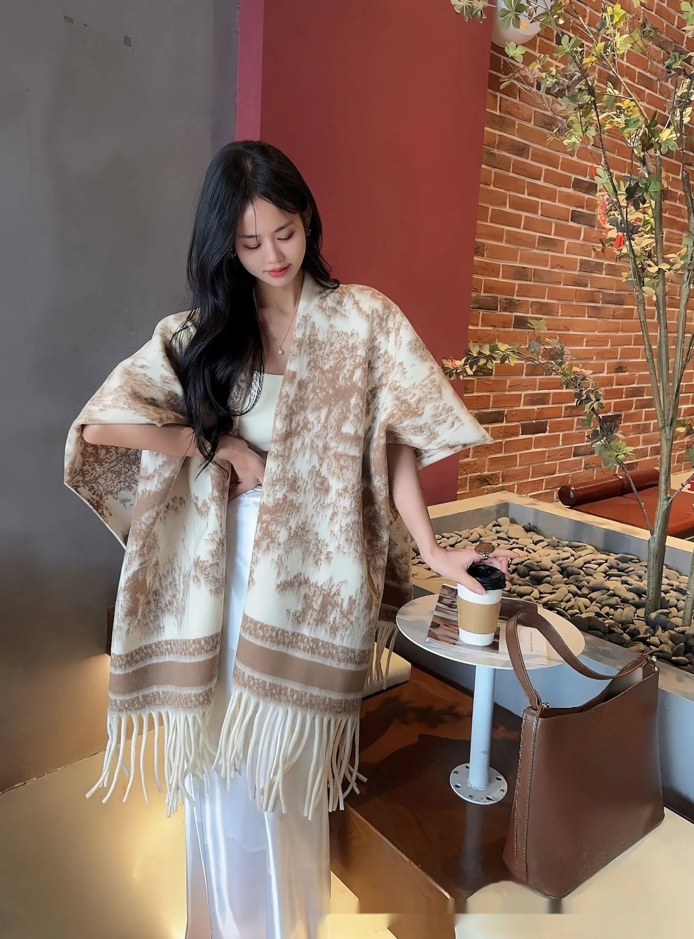 Women's polyester scarf cape with tassel trim in free size shawl style
