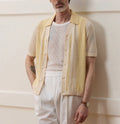 Yellow men's casual polo shirt with hollow-out pattern and asymmetric design in Tencel fabric