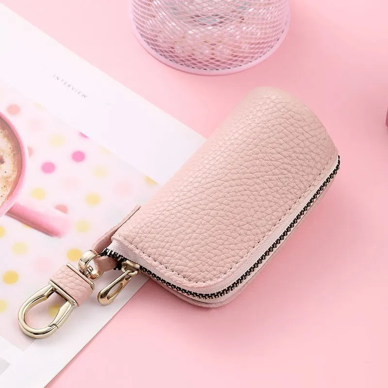 Waterproof pu leather key case in black, grey, and pink macaron colours with urban simplicity style