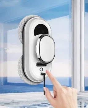 White automatic high altitude cleaning machine with remote control and accessories for exterior window cleaning.