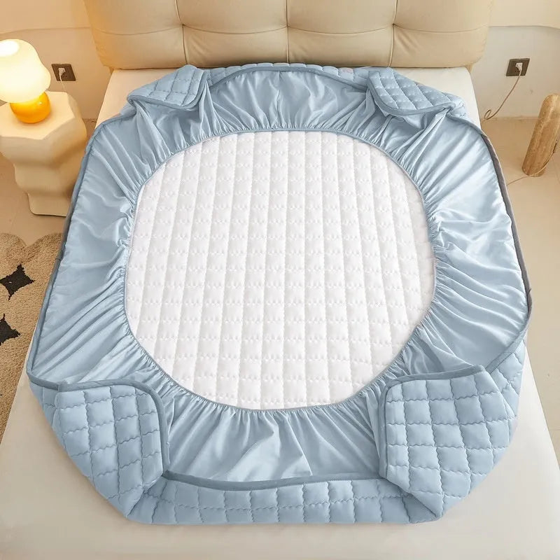 Class A maternal and child grade waterproof fitted sheet in blue colour with quilted edging
