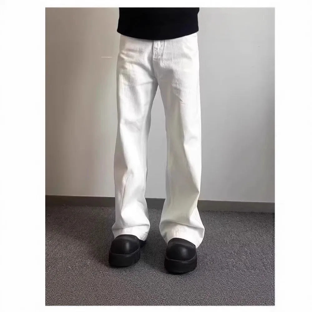 Men's white straight-leg jeans with loose fit and wide leg opening