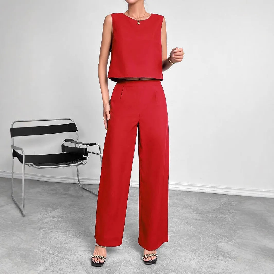 Women's red sleeveless top and wide-leg trousers two-piece polyester co-ord set on hanger